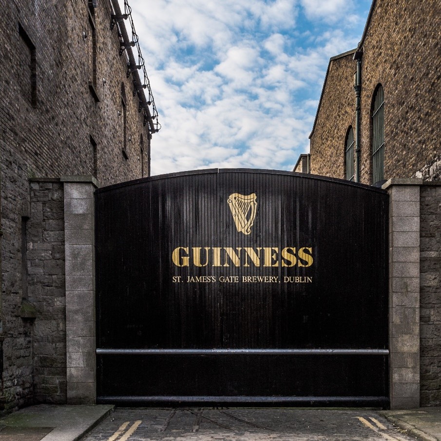 Black gate with Guinness logo