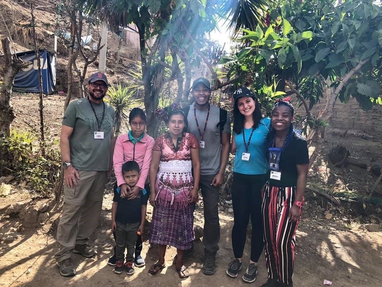IMG employees visit the village