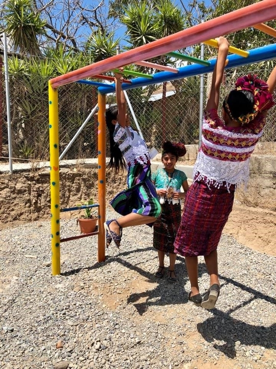 Kids playing on the new playground
