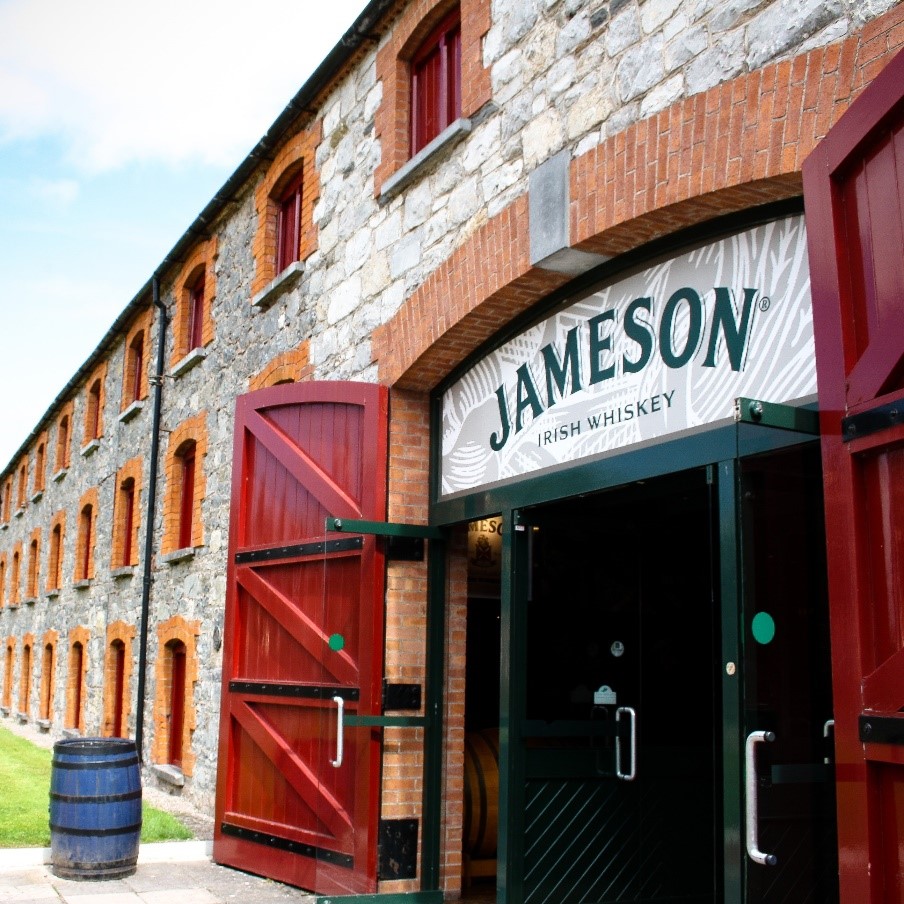 Jameson Irish Whiskey Distillery with red doors and blue barrel
